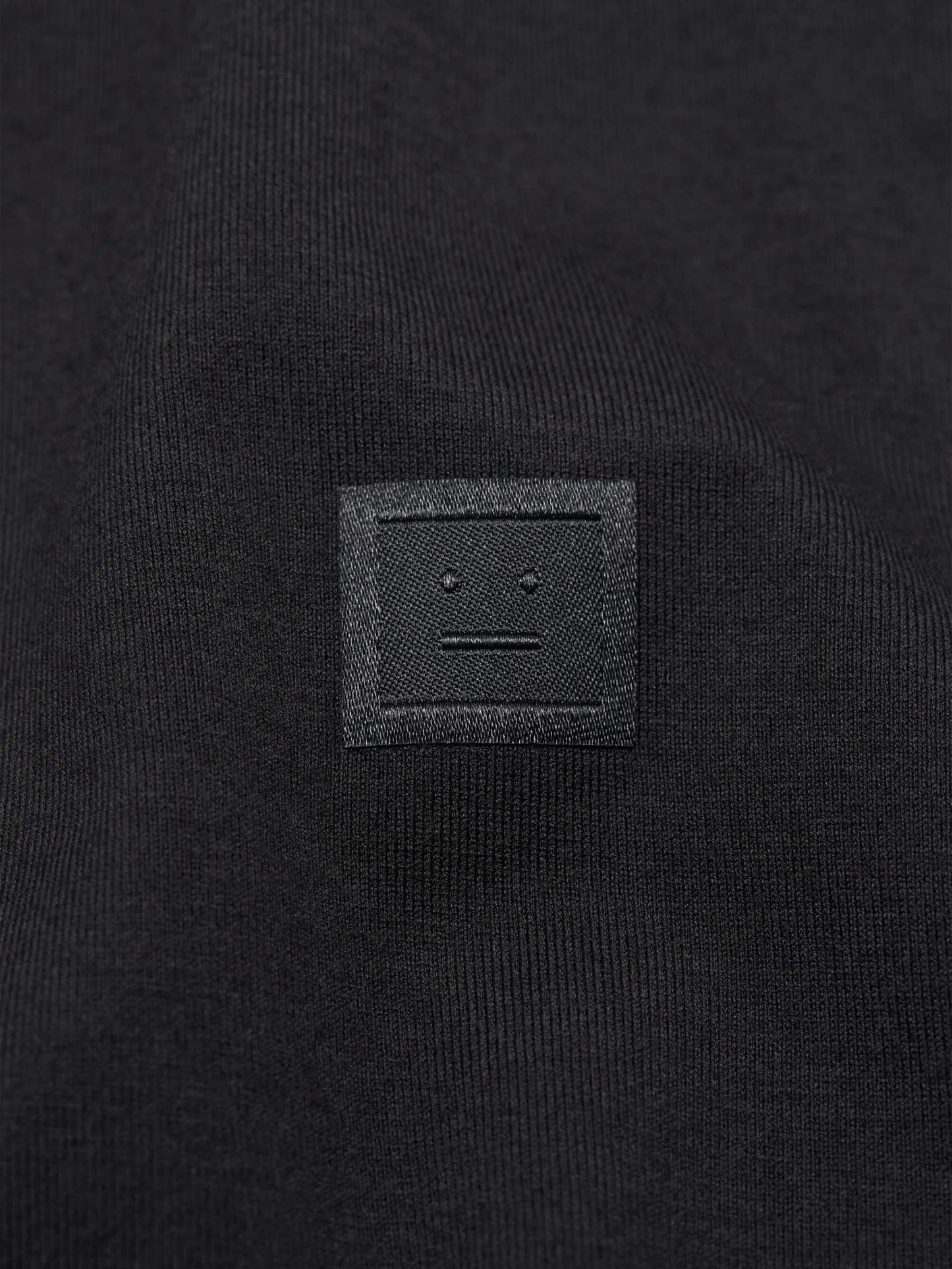 ACNE STUDIOS - T-Shirt mit Face Logo aus Baumwolle in Schwarz - Black