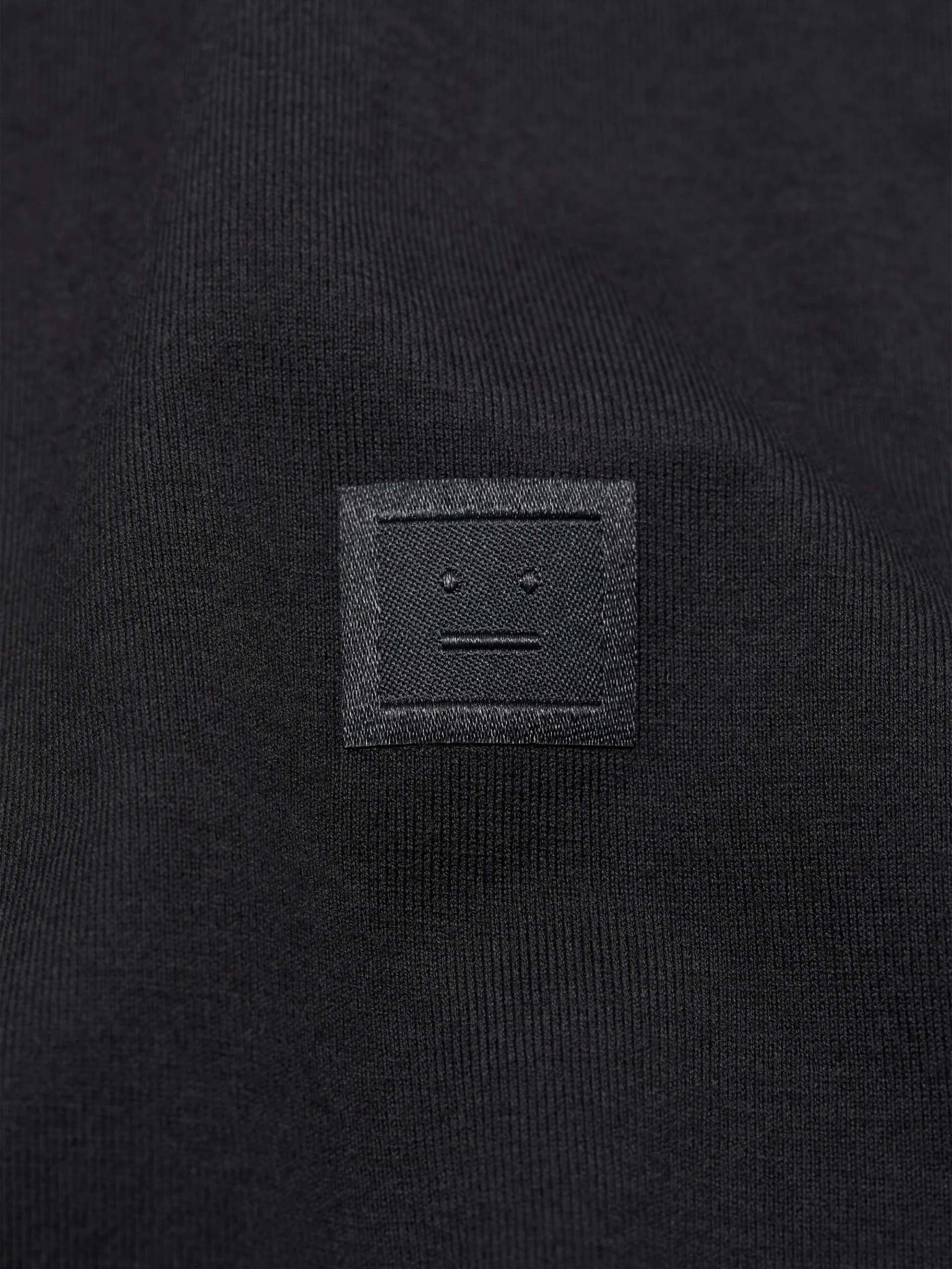 ACNE STUDIOS - T-Shirt mit Face Logo aus Baumwolle in Schwarz - Black