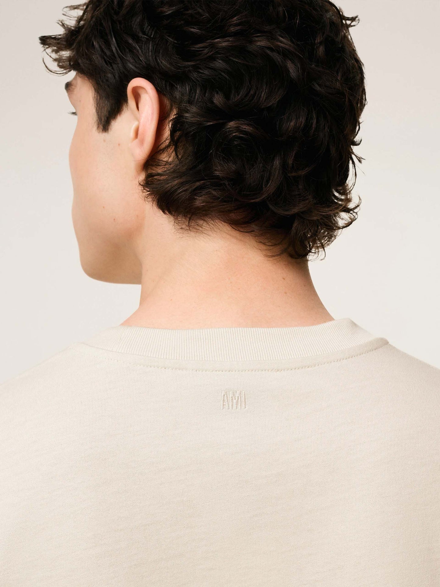 AMI PARIS - Oversized-T-Shirt aus Baumwolle mit Logo in Cremeweiß - Cream white