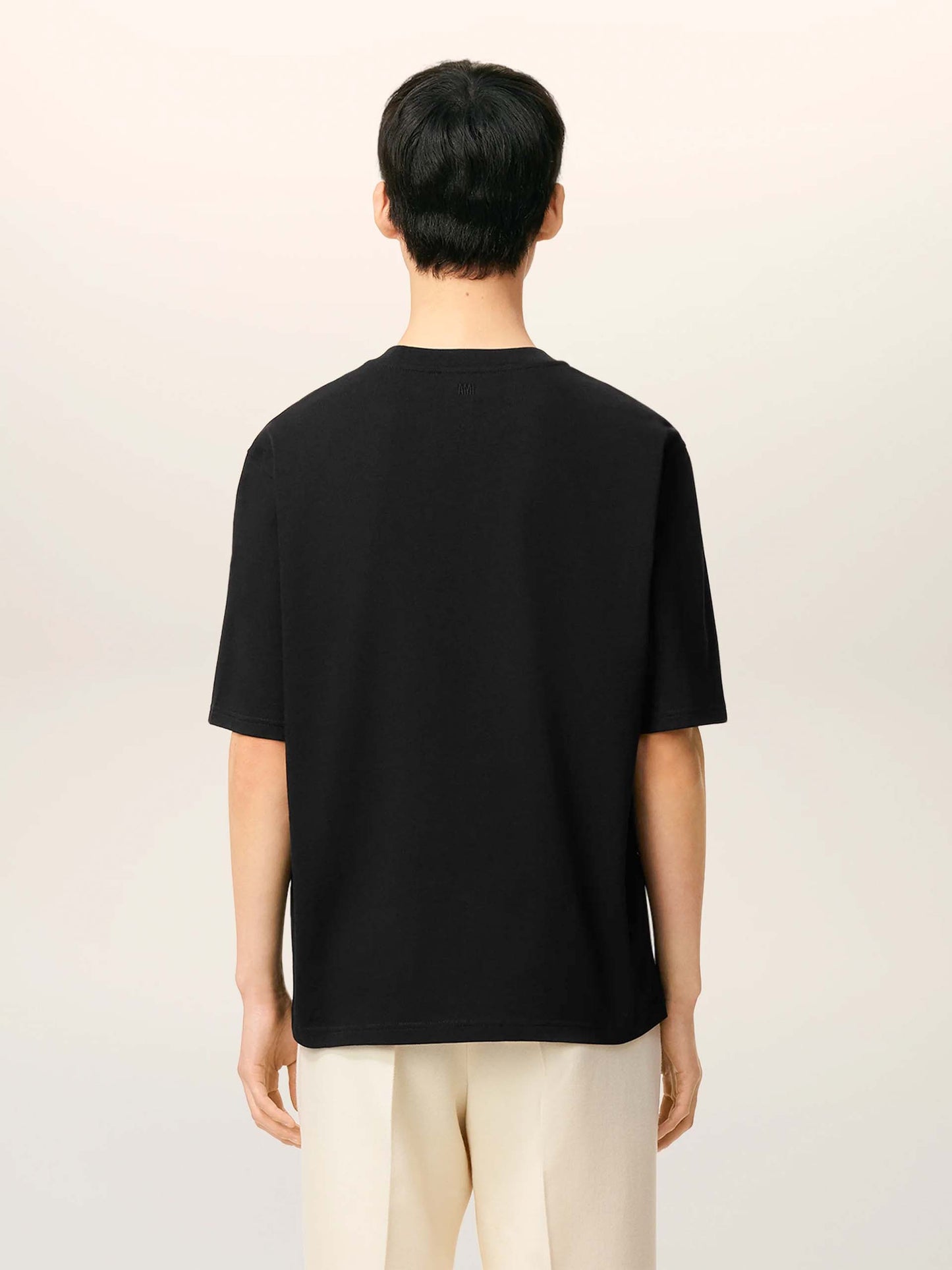 AMI PARIS - Oversized-T-Shirt aus Baumwolle mit Logo in Schwarz - Black