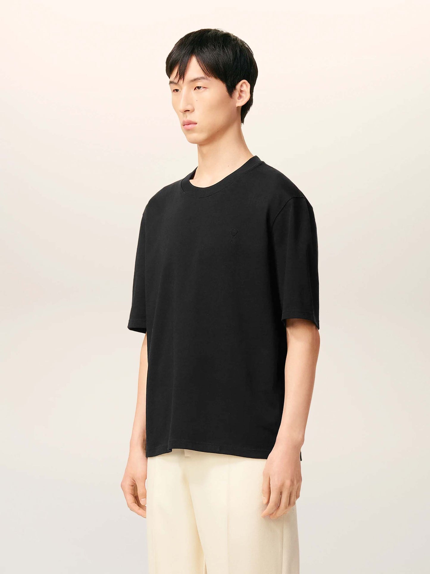 AMI PARIS - Oversized-T-Shirt aus Baumwolle mit Logo in Schwarz - Black
