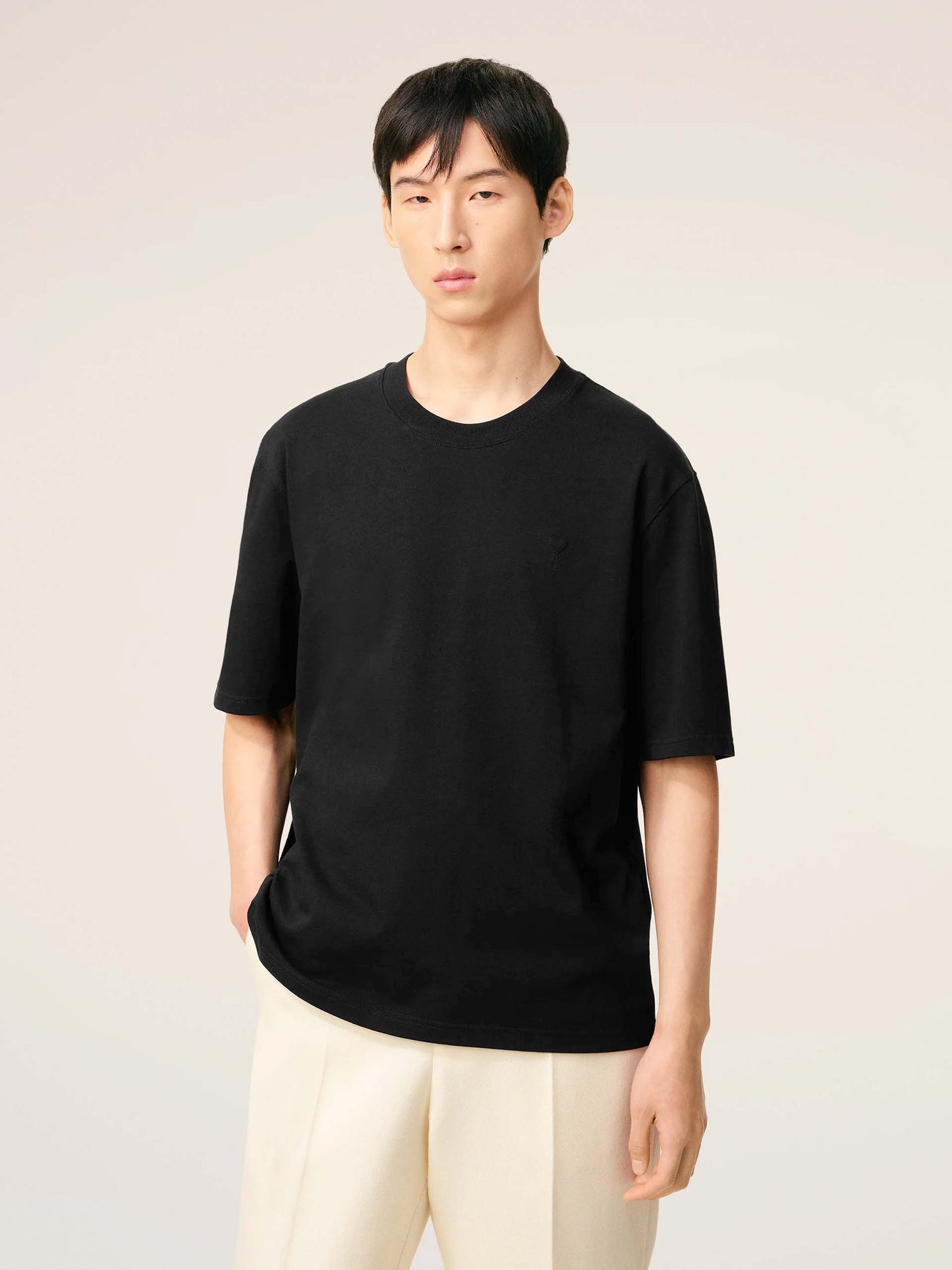 AMI PARIS - Oversized-T-Shirt aus Baumwolle mit Logo in Schwarz - Black