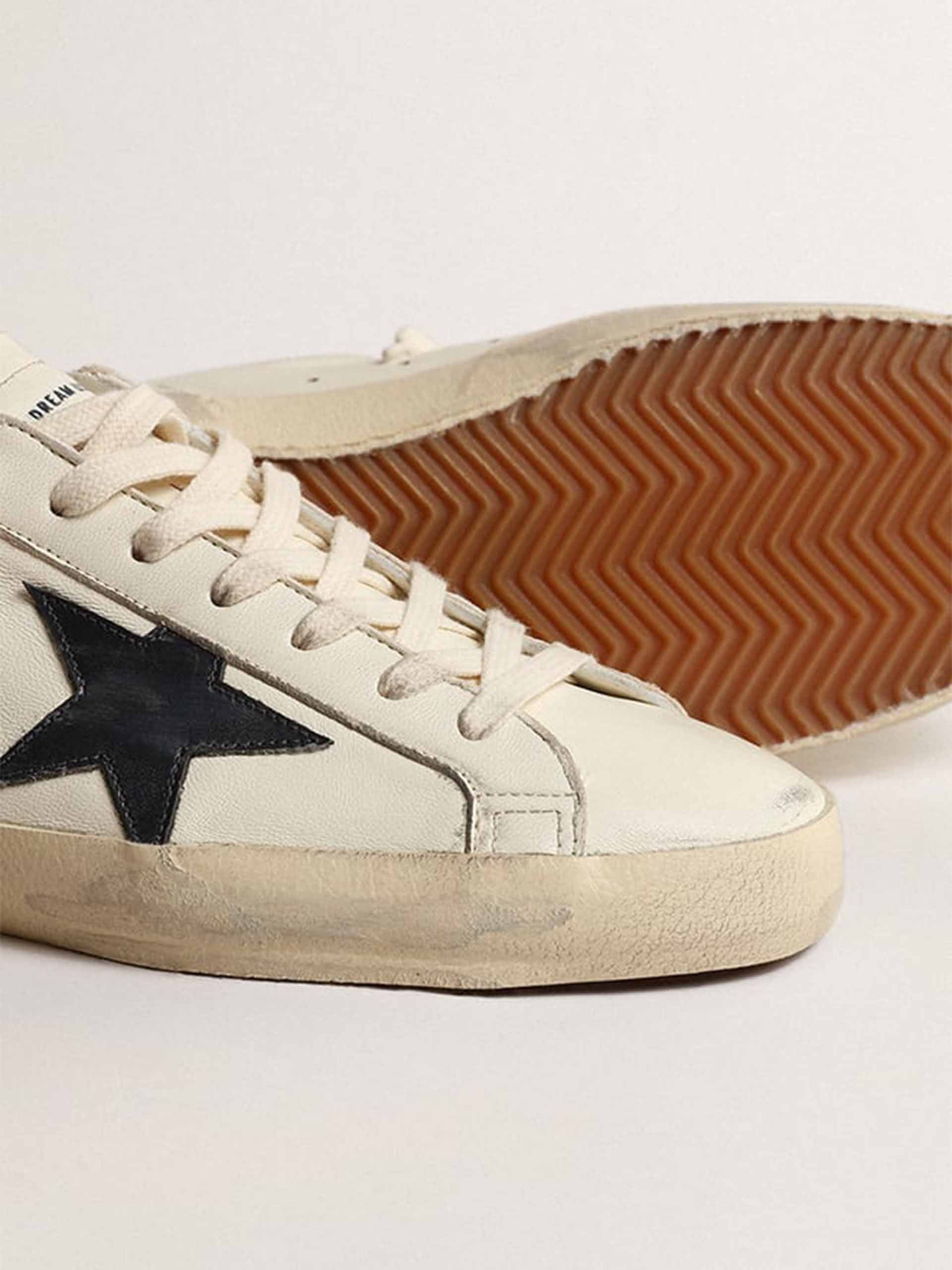 GOLDEN GOOSE - Sneakers Super-Star für Herren in Creme und Dunkelblau