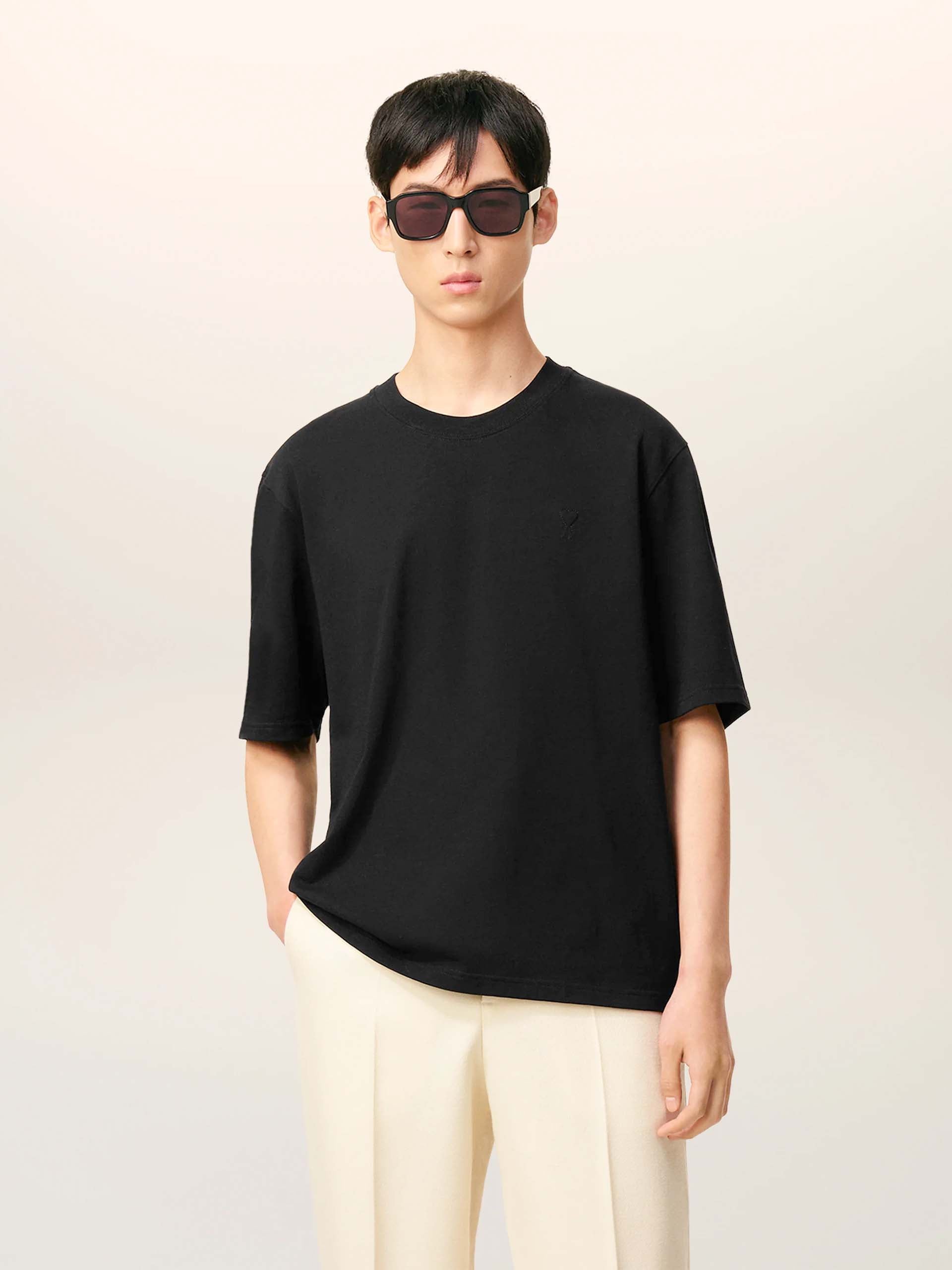 AMI PARIS - Oversized-T-Shirt aus Baumwolle mit Logo in Schwarz - Black