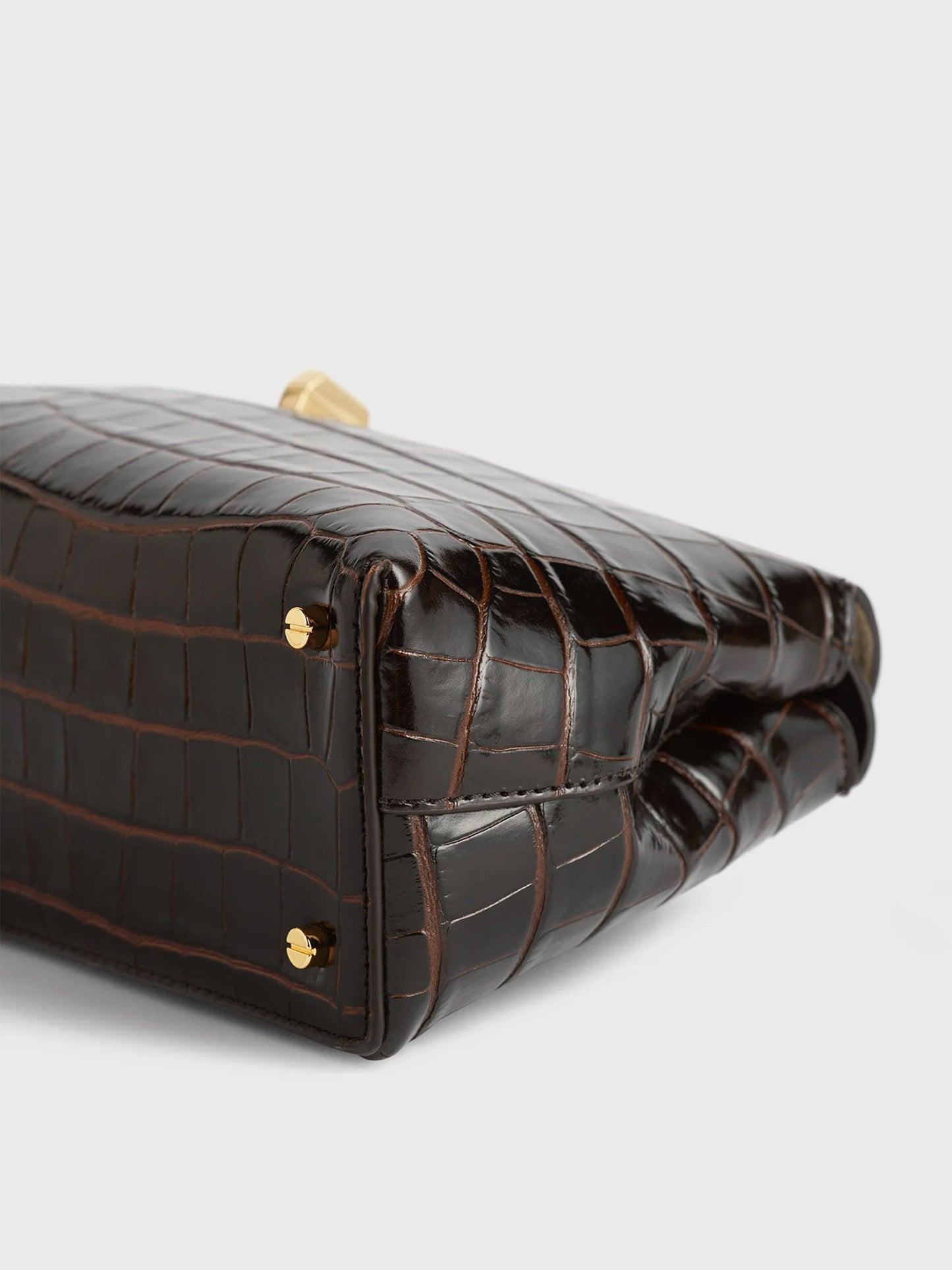 Toteme Clutch T-Lock aus Leder mit Kroko-Prägung Dunkelbraun