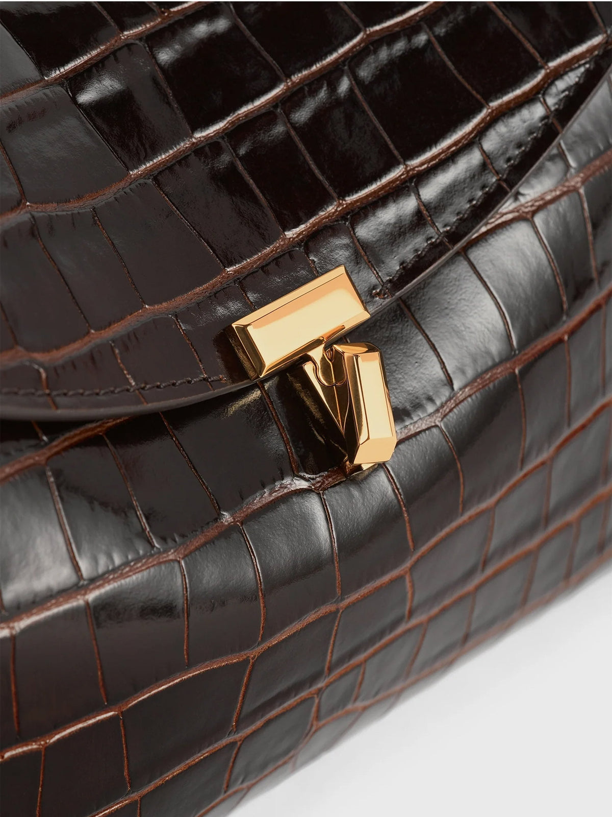 Toteme Clutch T-Lock aus Leder mit Kroko-Prägung Dunkelbraun